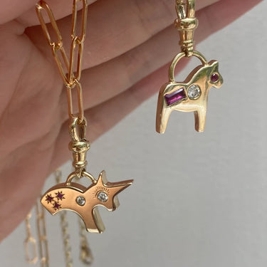 The Ruby and Diamond Dala Horse Charm on A Baby Belcher